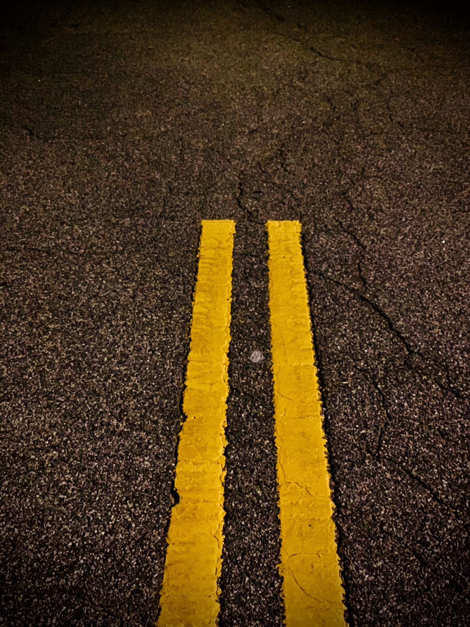 Yellow solid lines on road
